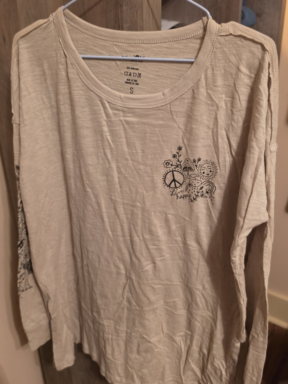 NATURAL LIFE Beige Long-Sleeve Tee with Black Peace Graphic